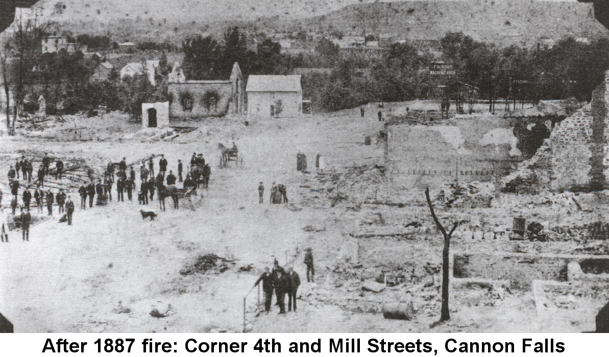 IMAGE/PHOTO: After 1887 fire, Corner 4th and Mill Streets, Cannon Falls: Black and white photo of the corner of the west side of 4t. St. and Mill St. Cannon Falls, looking north, showing numerous people and a horse and wagon gathered in fromt of the location of the later Meyer & Johns Dry Goods store, and the stone vault of the Citizens Bank building standing along amid ruins in the distance.